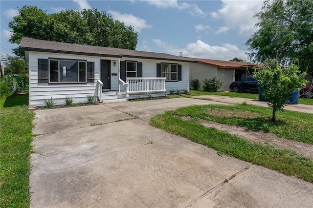 1122 Dorthy Dr, Corpus Christi, TX 78412 - ranch-style home with covered porch and driveway