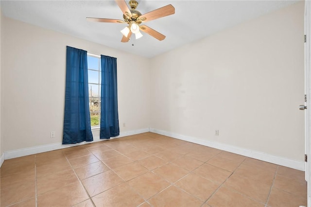 unfurnished room featuring light tile patterned flooring and ceiling fan