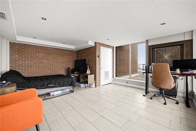 715 S Upper Broadway St Unit 1501, Corpus Christi, TX 78401 - home office featuring brick wall and recessed lighting