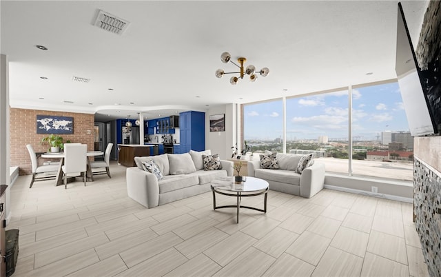 715 S Upper Broadway St Unit 1501, Corpus Christi, TX 78401 - living room featuring a chandelier
