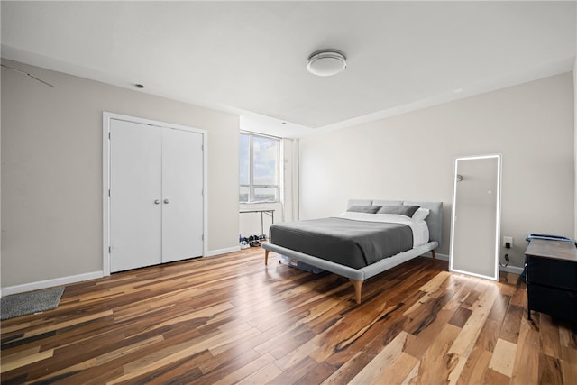 715 S Upper Broadway St Unit 1501, Corpus Christi, TX 78401 - bedroom featuring wood finished floors and baseboards