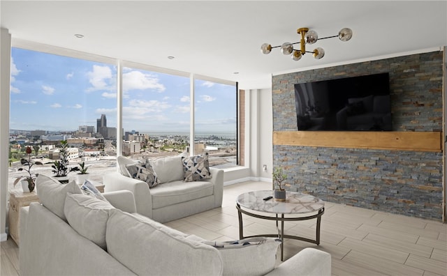 living room featuring expansive windows and light hardwood / wood-style floors