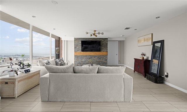 715 S Upper Broadway St Unit 1501, Corpus Christi, TX 78401 - living room with floor to ceiling windows and baseboards