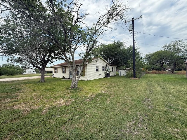 9047 County Road 471, Mathis, TX 78368 - view of grassy yard