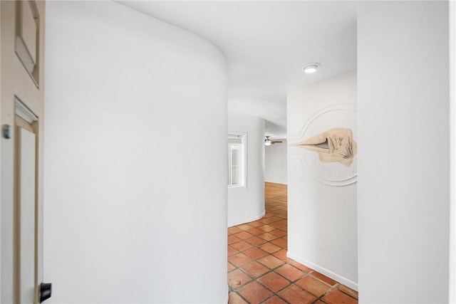 hallway featuring tile patterned floors