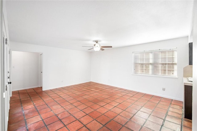 unfurnished room with ceiling fan