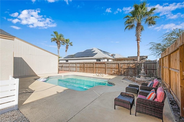 view of swimming pool featuring a patio area