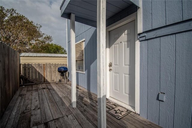 938 E Lakeside Dr, Corpus Christi, TX 78418 - doorway to property featuring a wooden deck