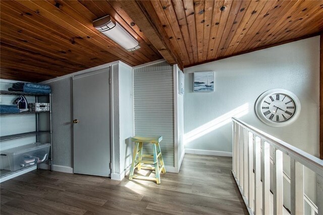 938 E Lakeside Dr, Corpus Christi, TX 78418 - hall featuring wooden ceiling, baseboards, wood finished floors, vaulted ceiling, and an upstairs landing