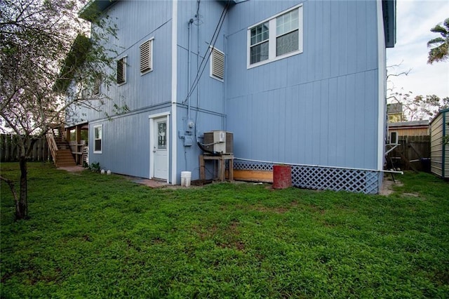 938 E Lakeside Dr, Corpus Christi, TX 78418 - rear view of property featuring stairway