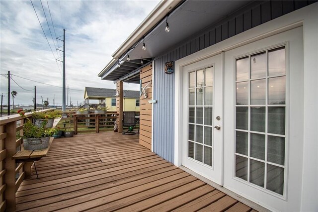 938 E Lakeside Dr, Corpus Christi, TX 78418 - wooden terrace with french doors