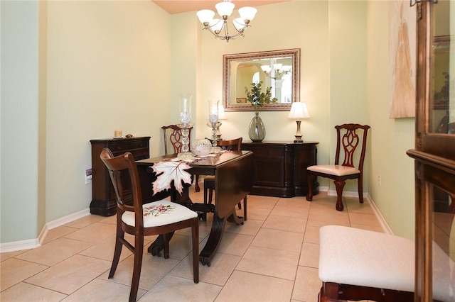 sitting room with light tile patterned floors and a notable chandelier