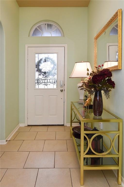 view of tiled foyer entrance