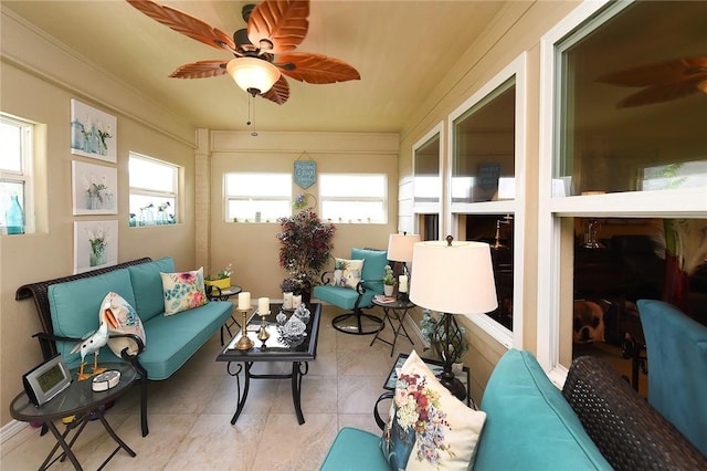 sunroom with ceiling fan