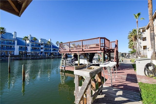 dock area with a water view