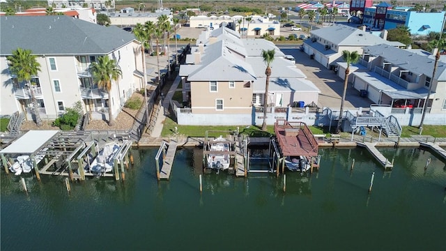 aerial view featuring a residential view and a water view