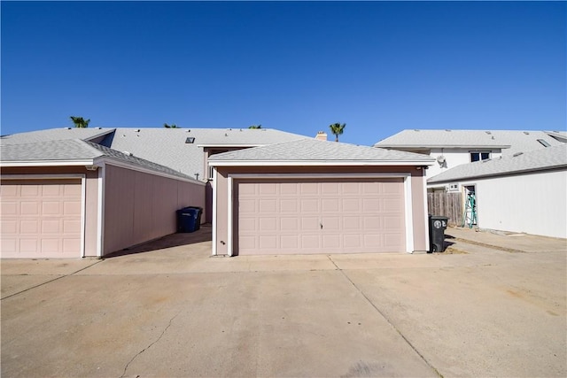 detached garage with fence