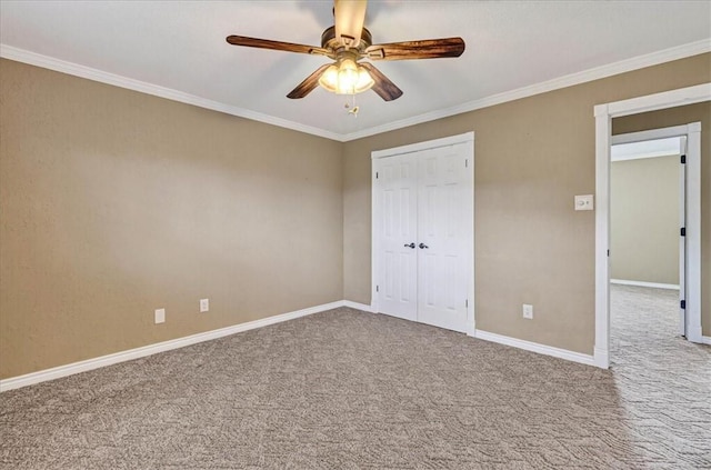 11129 Mulholland Dr, Corpus Christi, TX 78410 - unfurnished bedroom featuring carpet, crown molding, a closet, and a ceiling fan