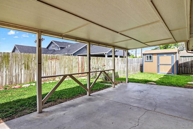 11129 Mulholland Dr, Corpus Christi, TX 78410 - fenced backyard with a patio area and a shed