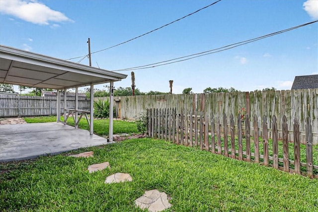 11129 Mulholland Dr, Corpus Christi, TX 78410 - fenced backyard featuring a patio area
