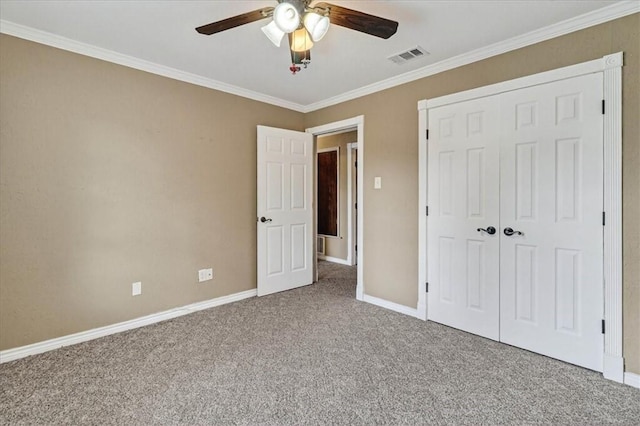 11129 Mulholland Dr, Corpus Christi, TX 78410 - unfurnished bedroom featuring carpet floors, ornamental molding, a closet, and ceiling fan