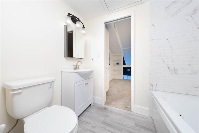 bathroom featuring vanity and wood finished floors