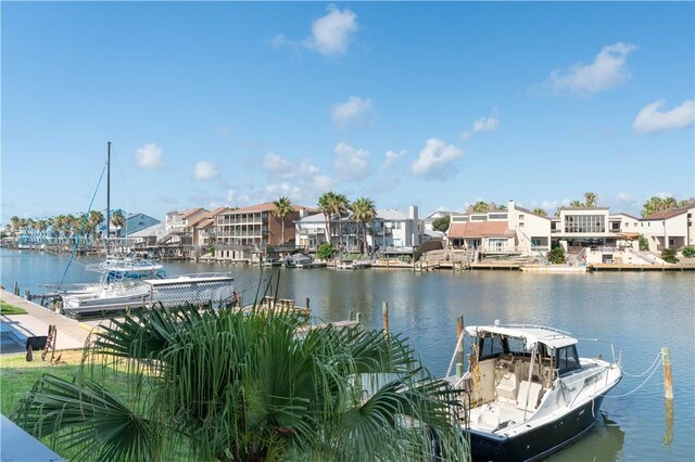 dock featuring a water view and a residential view