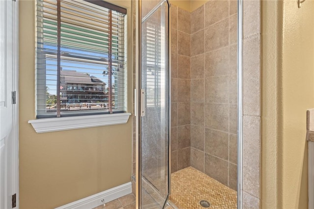 227 Windjammer St, Rockport, TX 78382 - bathroom featuring a shower stall and baseboards