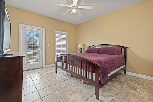 227 Windjammer St, Rockport, TX 78382 - bedroom with access to outside, light tile patterned floors, baseboards, and ceiling fan