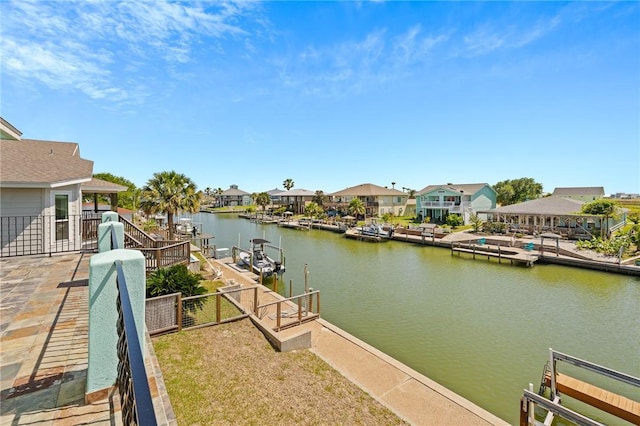 227 Windjammer St, Rockport, TX 78382 - dock area featuring a water view and a residential view