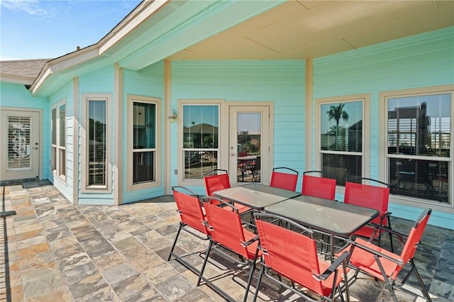 227 Windjammer St, Rockport, TX 78382 - view of patio / terrace with outdoor dining area