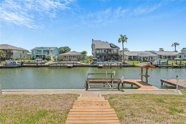 227 Windjammer St, Rockport, TX 78382 - dock area featuring a residential view, a water view, and boat lift