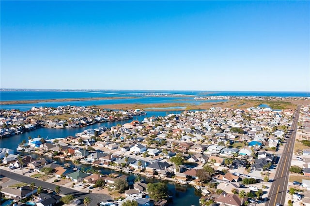 13845 Jolly Roger St, Corpus Christi, TX 78418 - aerial view of property's location featuring a nearby body of water and nearby suburban area