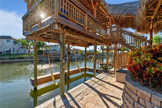 dock area with a water and mountain view