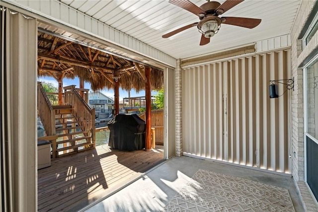 13845 Jolly Roger St, Corpus Christi, TX 78418 - wooden deck featuring stairway, a ceiling fan, and area for grilling