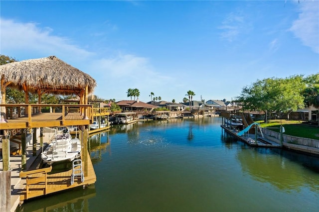 dock area featuring a gazebo and a water view