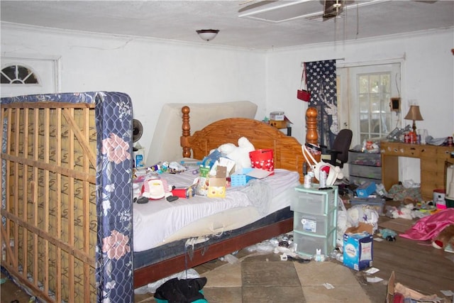 bedroom featuring ornamental molding