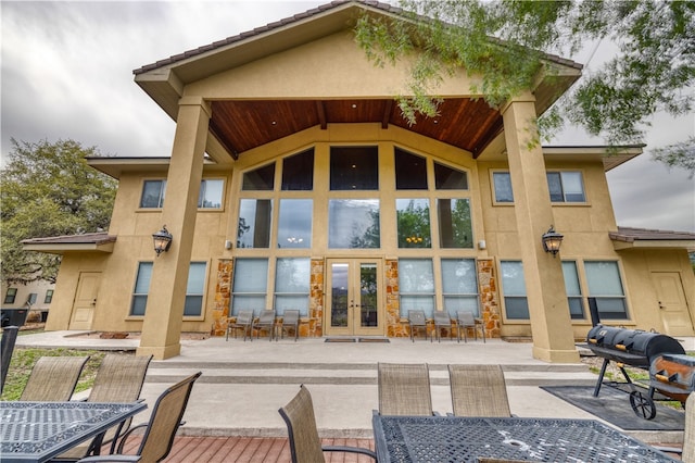 back of house featuring french doors and a patio area