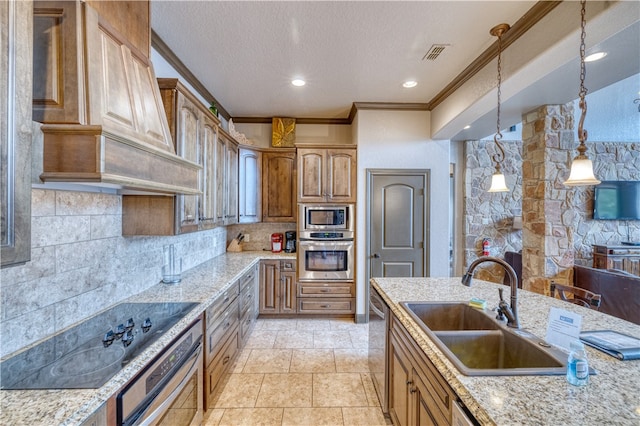 kitchen with stainless steel appliances, hanging light fixtures, a textured ceiling, sink, and crown molding