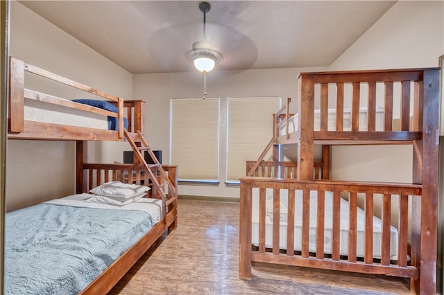 bedroom with hardwood / wood-style flooring and ceiling fan