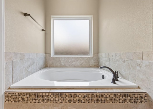 15229 Capstan St, Corpus Christi, TX 78418 - bathroom with a garden tub and a textured wall