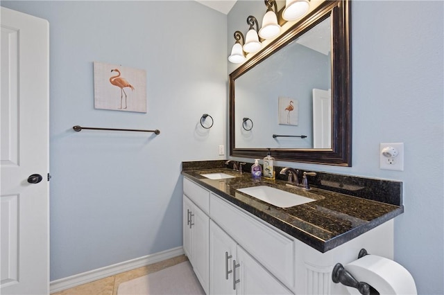 15229 Capstan St, Corpus Christi, TX 78418 - bathroom with double vanity and tile patterned floors
