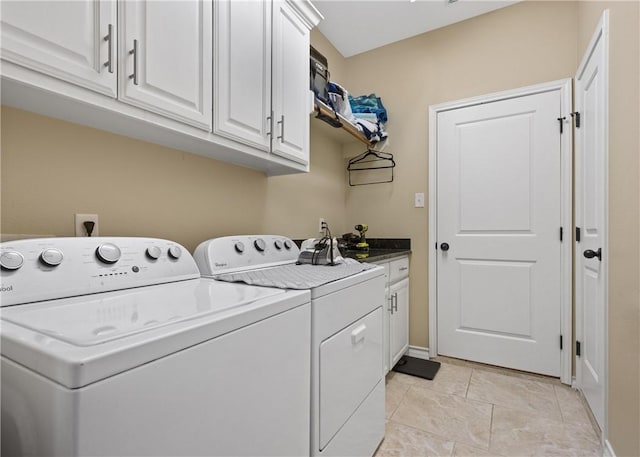 15229 Capstan St, Corpus Christi, TX 78418 - washroom featuring washing machine and clothes dryer, cabinet space, and light tile patterned flooring