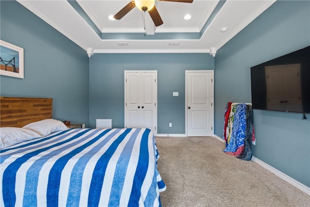 15229 Capstan St, Corpus Christi, TX 78418 - carpeted bedroom featuring crown molding, a tray ceiling, a ceiling fan, a closet, and recessed lighting