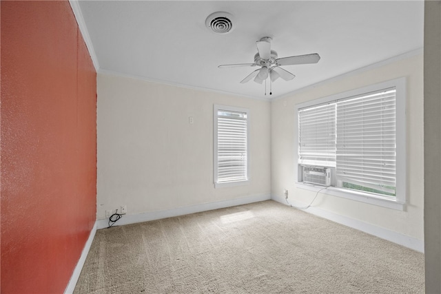 carpeted empty room with cooling unit, ceiling fan, and crown molding