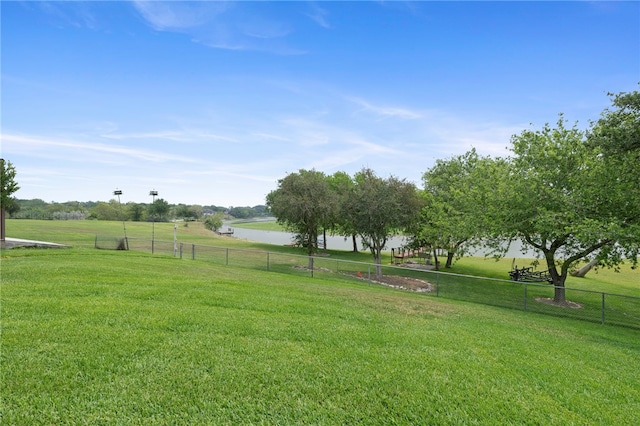 view of yard featuring a water view and a rural view