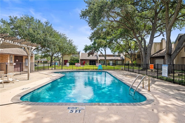5418 Stonegate Way, Corpus Christi, TX 78411 - community pool featuring a patio area, a pergola, and a residential view