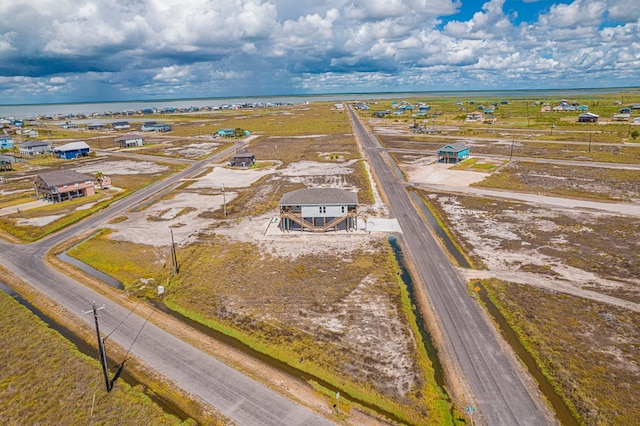 birds eye view of property with a rural view