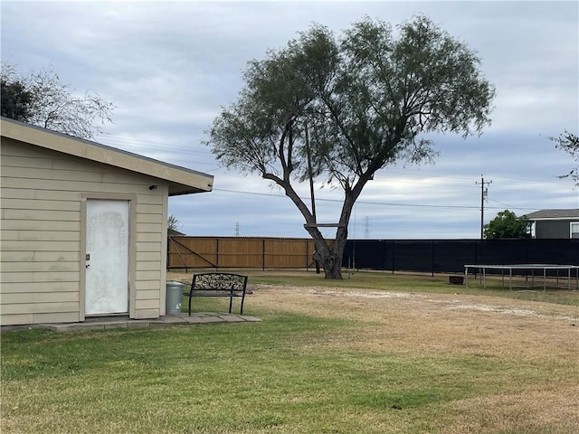 view of yard with a trampoline