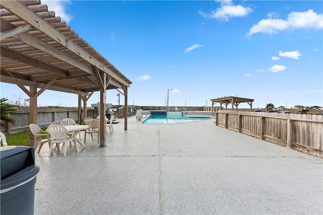 view of pool with a patio and a gazebo